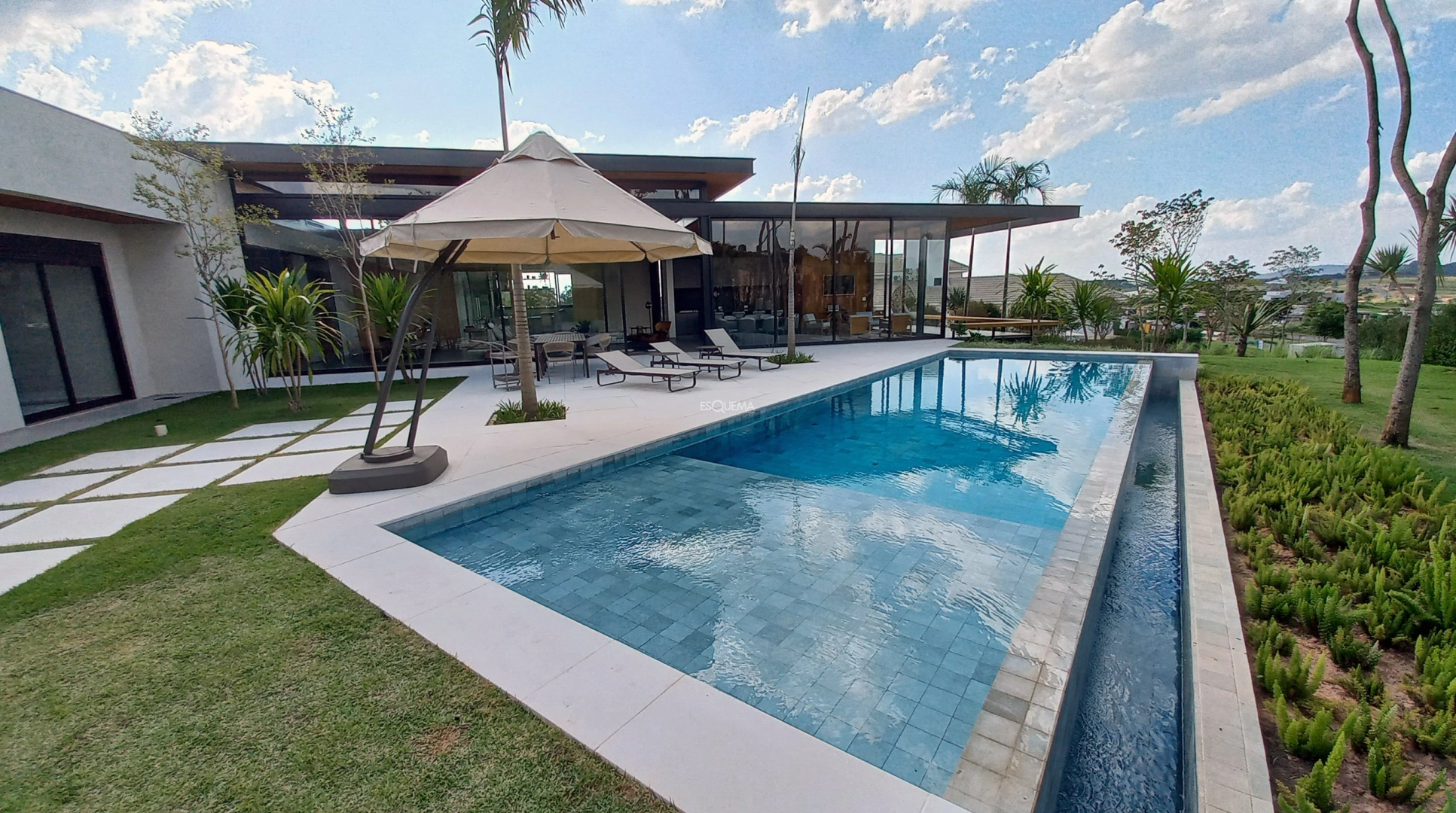 Casa em estilo contemporâneo projetada por Cristiano Ribeiro - Imagem 6