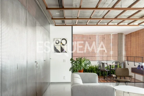 Apartamento decorado por Pascali Semerdijian em edifício com arquitetura de Marcio Kogan