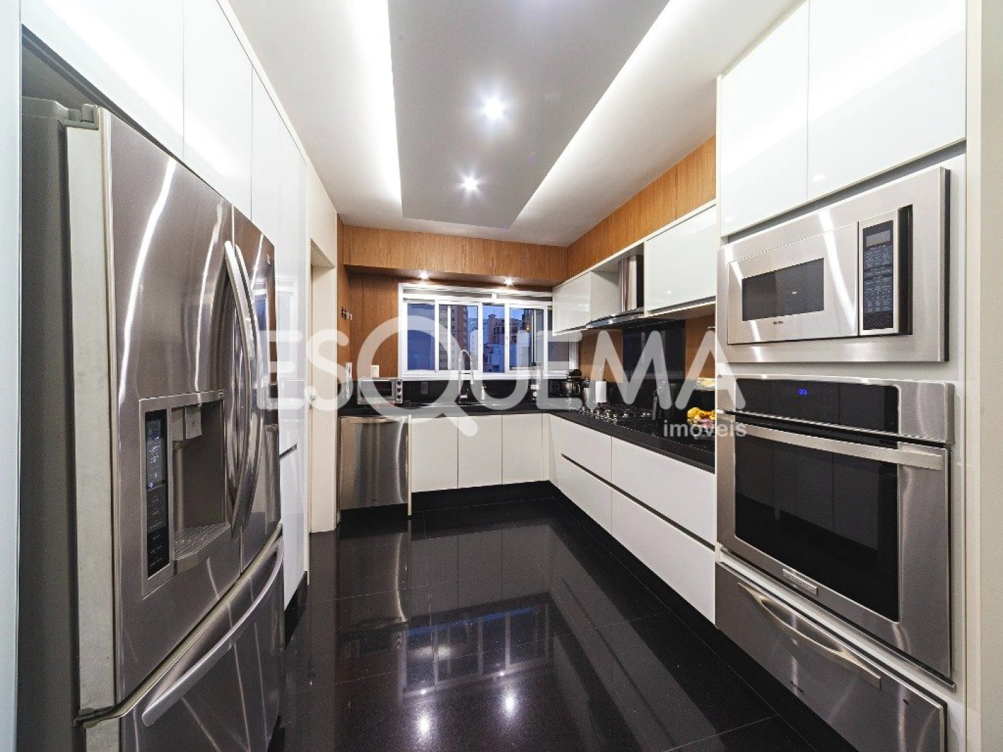 Apartamento com varanda gourmet e lareira em Moema - Imagem 11