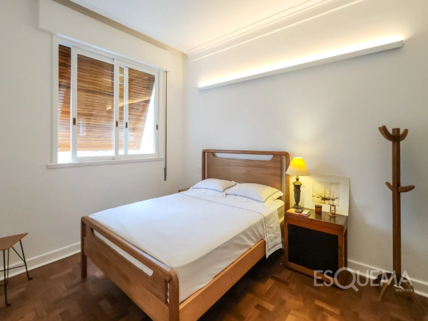 Apartamento iluminado com pé-direito alto e vista para o verde em Higienópolis - Imagem 7