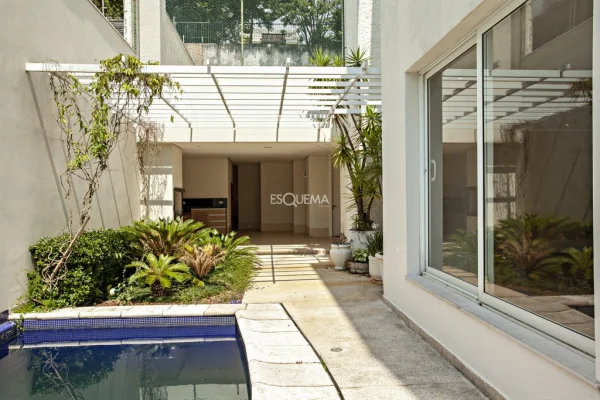 Casa contemporânea com piscina e área de lazer completa na Cidade Jardim