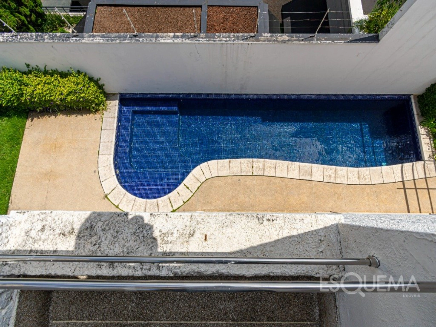 Casa contemporânea com piscina e área de lazer completa na Cidade Jardim - Imagem 6