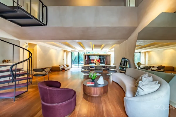 Casa com brutalismo reinterpretado e rooftop voltado ao pôr do sol em Pinheiros