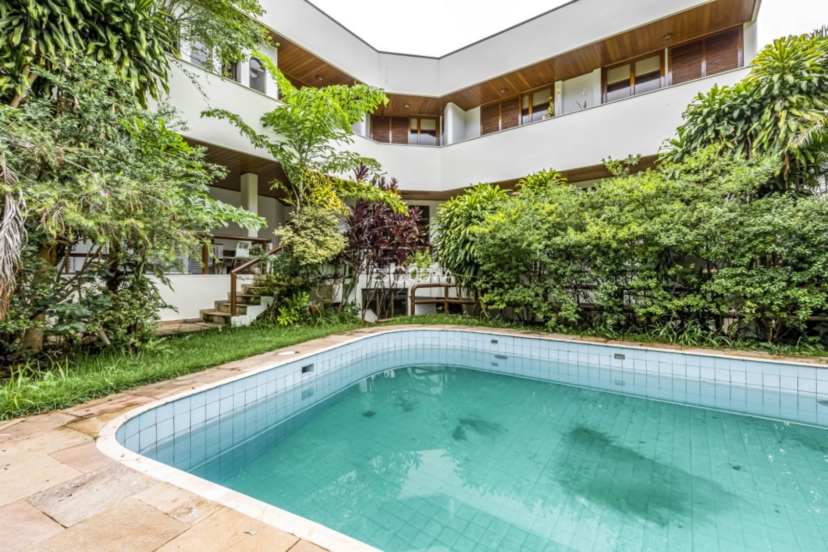 Casa em região arborizada e tranquila - Imagem 1